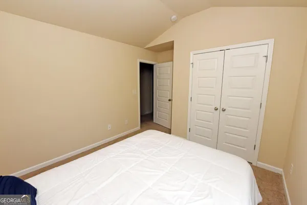 a view of a room with an empty space