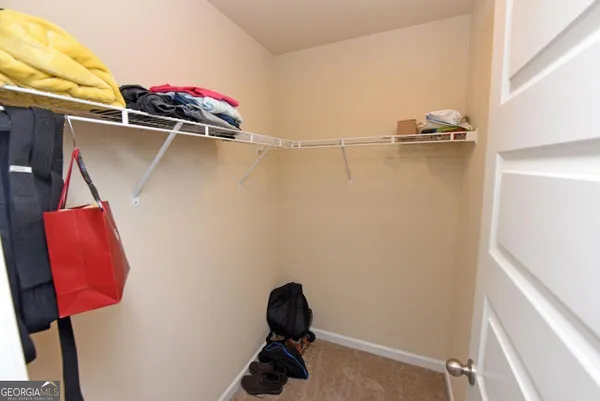 a bathroom with a shower and a vanity