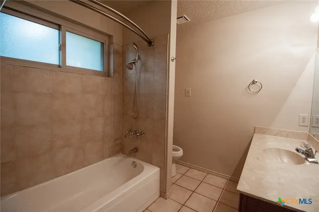 a bathroom with a sink and a tub