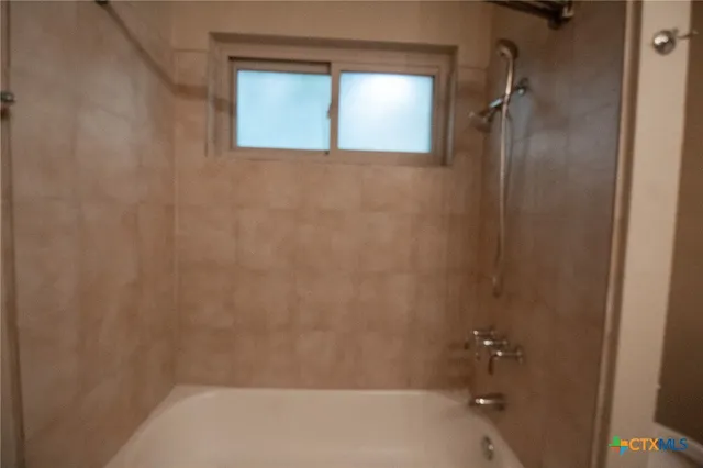 a bathroom with a bathtub