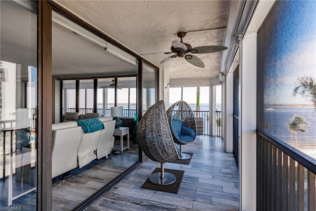 17170 Harbour Point Drive, Unit 437 Fort Myers, FL 33908 - Photo 35 of 41 Sunroom featuring ceiling fan