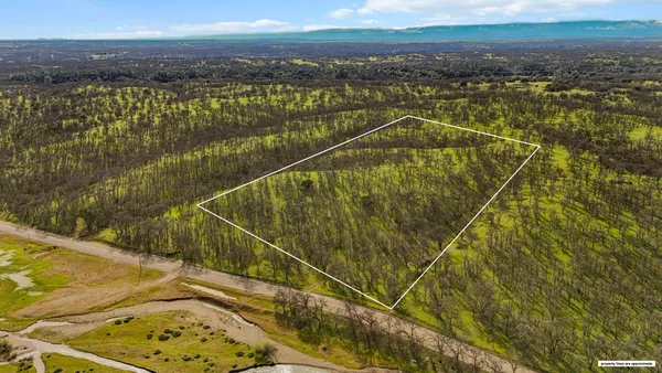 a view of a balcony with ocean view