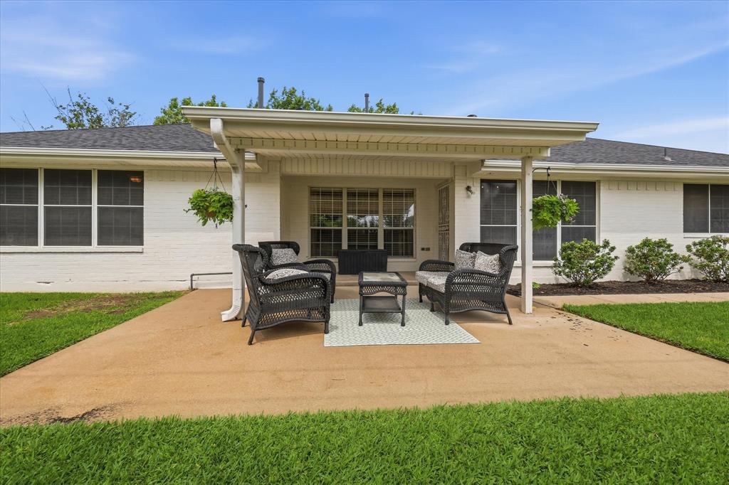 202 Colonial Heights Sanger, TX 76266 - Photo 23 of 27 front view of house with a patio