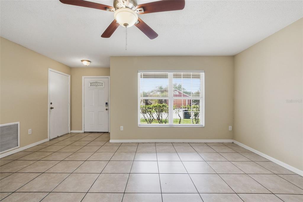 617 Greys Ferry Road Orlando, FL 32811 - Photo 8 of 35 a view of an empty room with a window