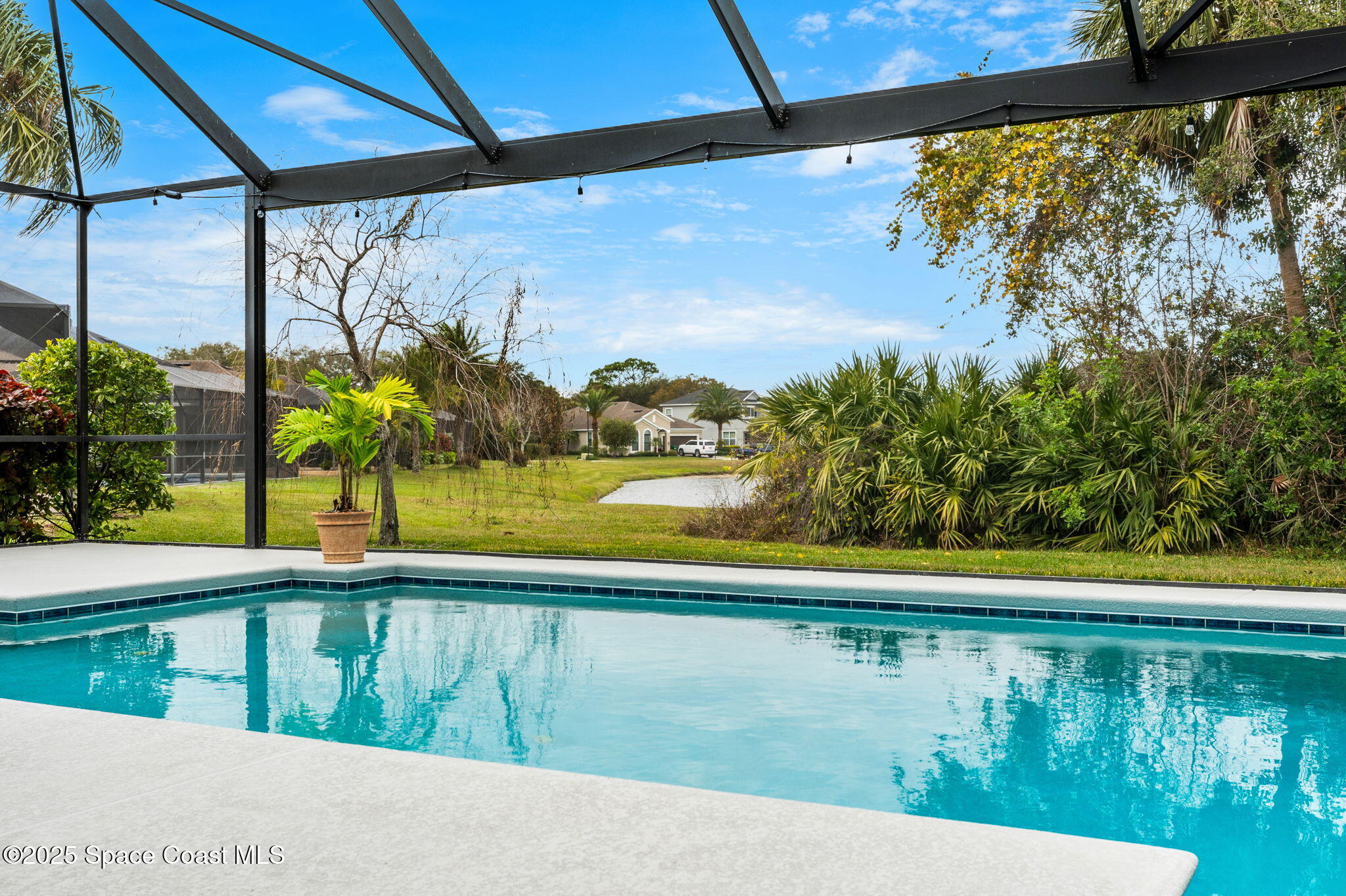 8545 Stalwart Circle Melbourne, FL 32940 - Photo 14 of 51 a view of swimming pool with a yard