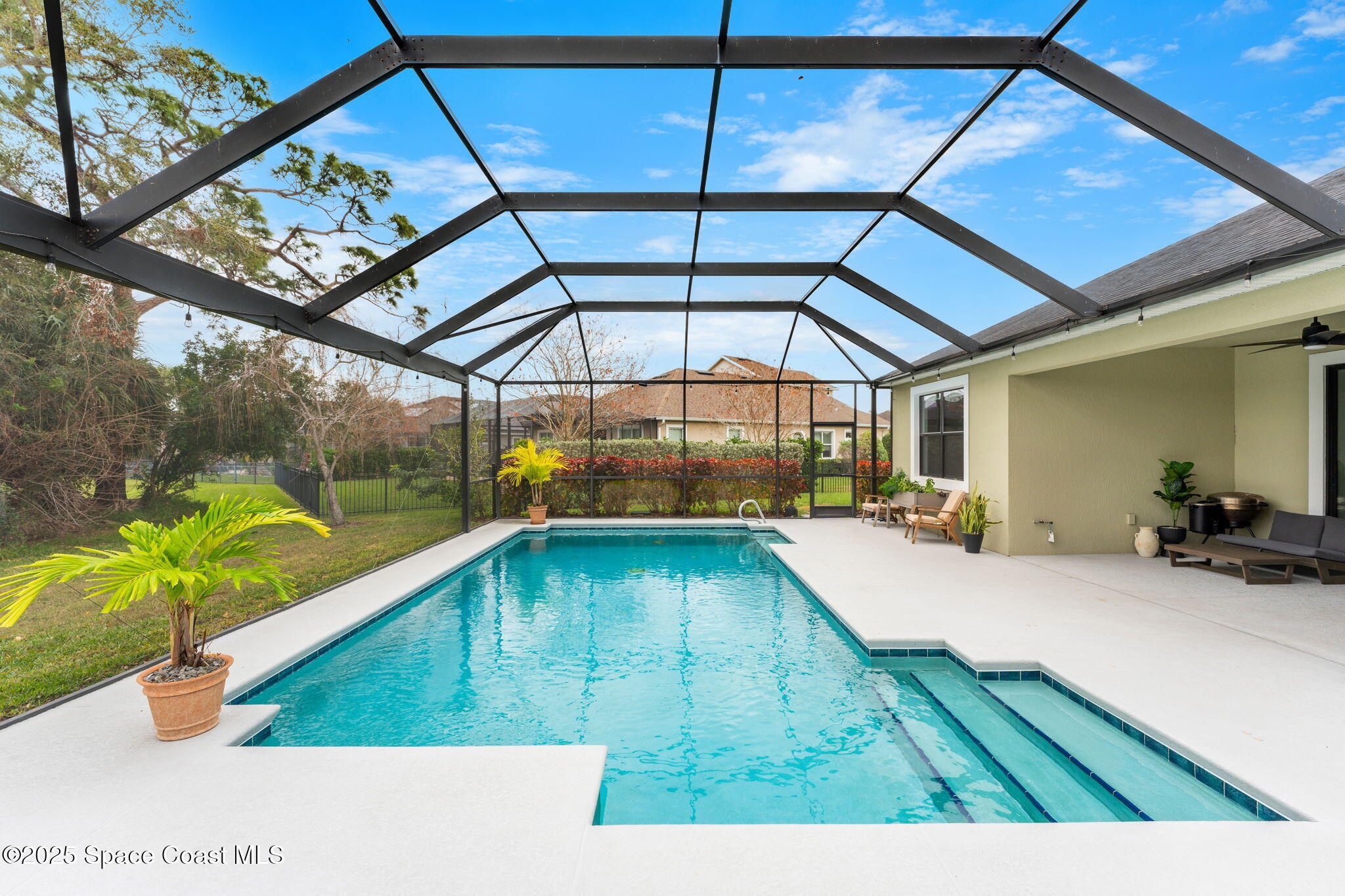 8545 Stalwart Circle Melbourne, FL 32940 - Photo 15 of 51 a swimming pool with a yard