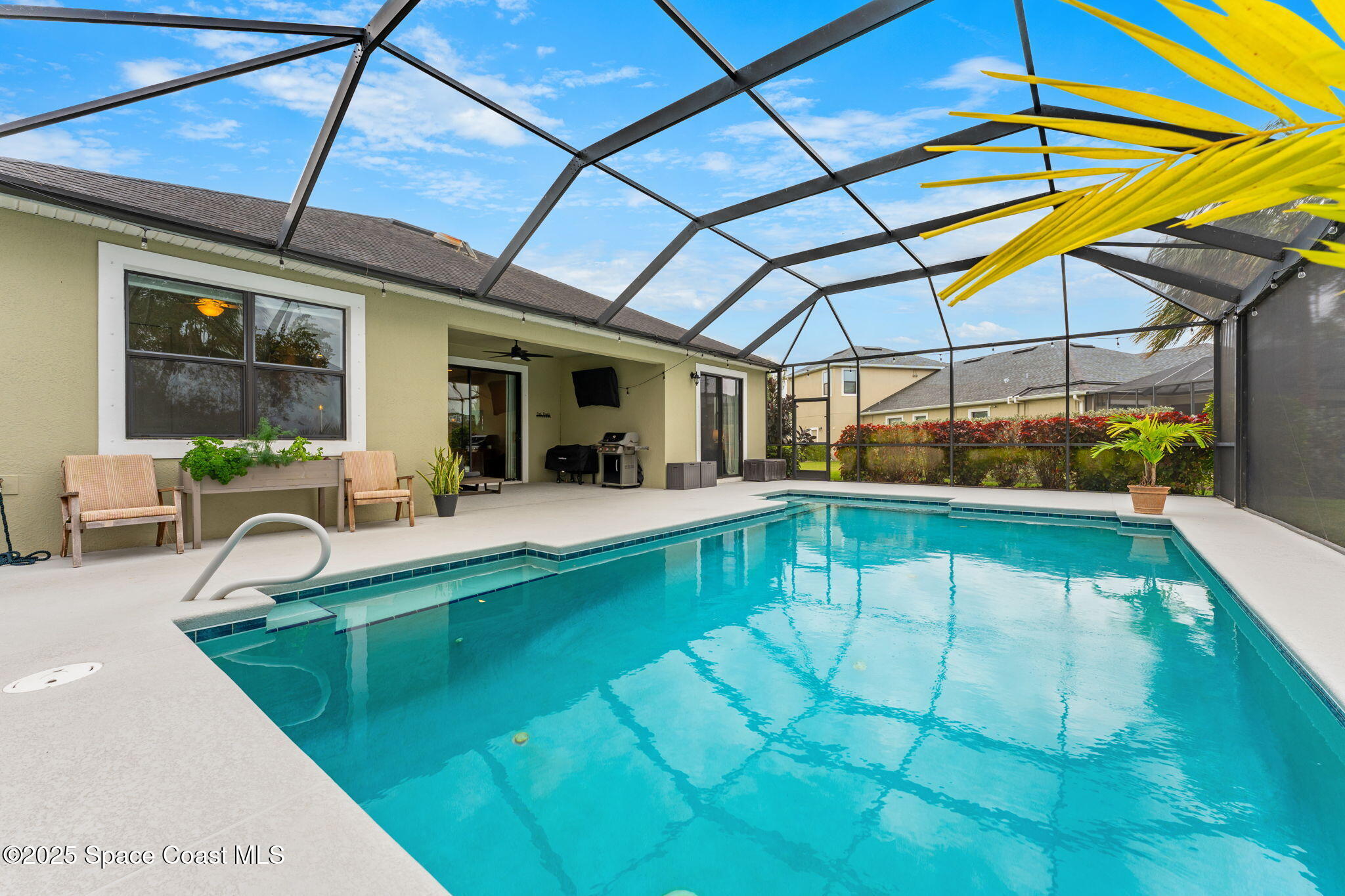 8545 Stalwart Circle Melbourne, FL 32940 - Photo 16 of 51 a view of swimming pool with seating area