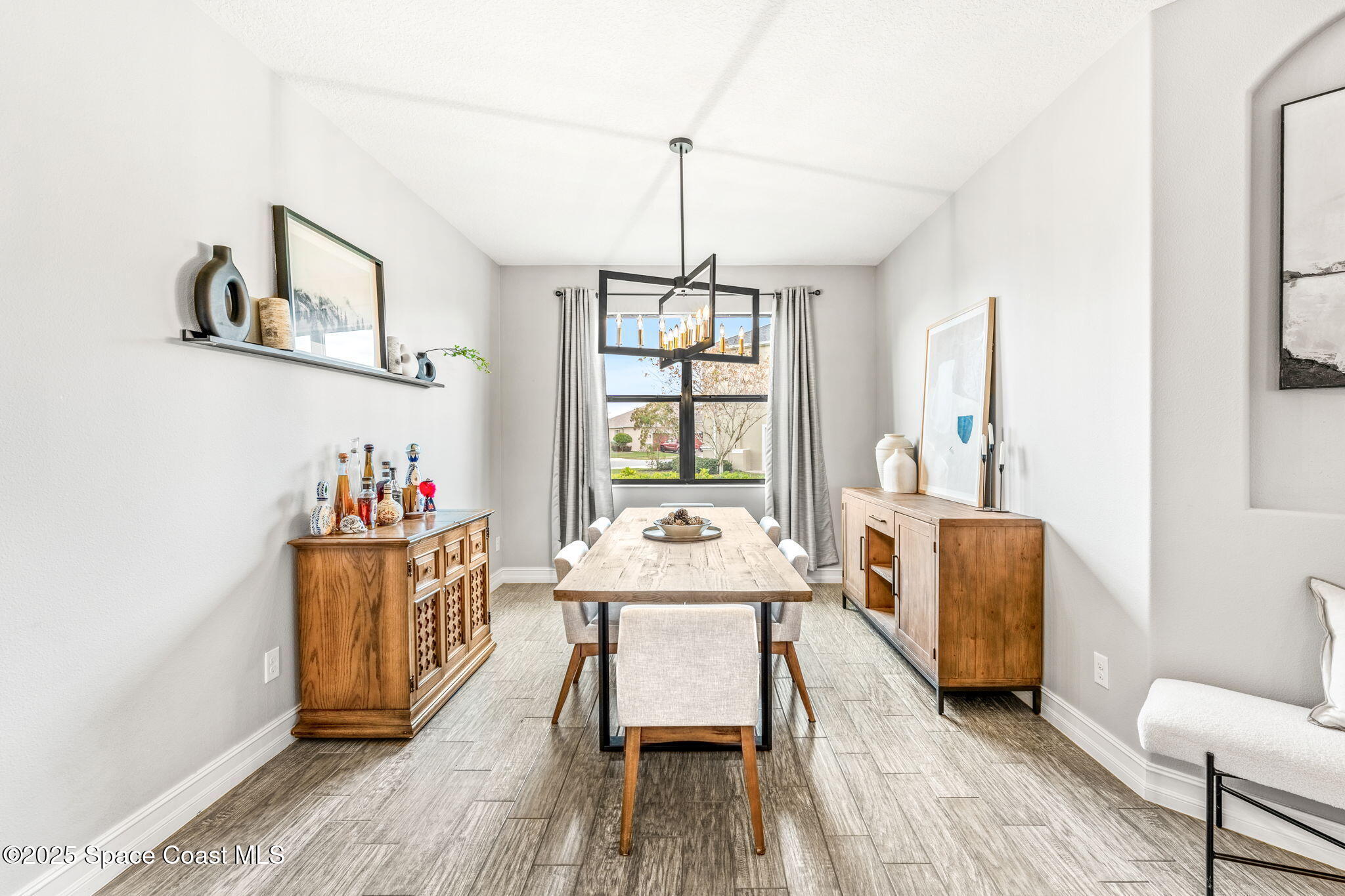 8545 Stalwart Circle Melbourne, FL 32940 - Photo 20 of 51 a dining room with furniture and window