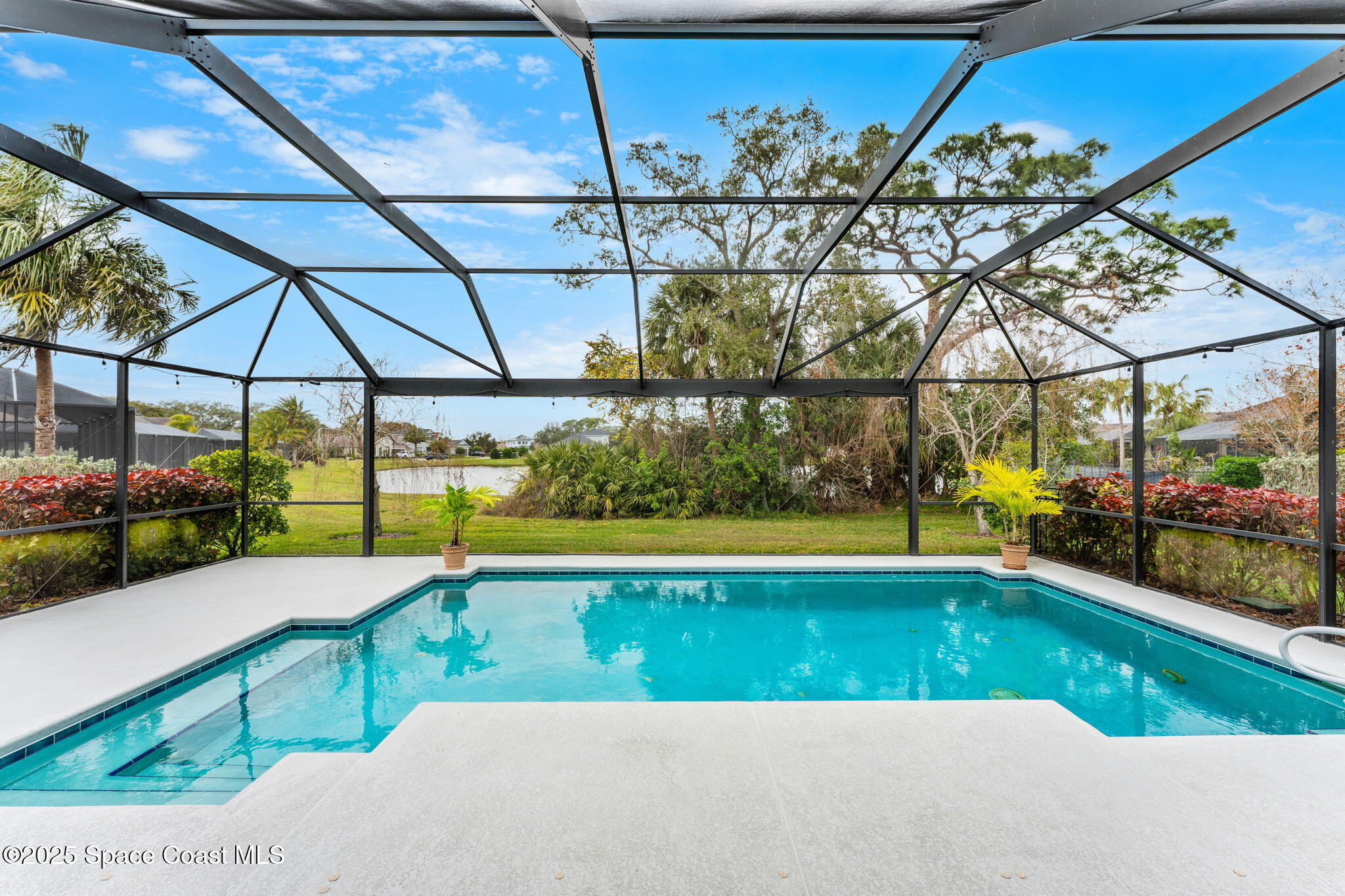 8545 Stalwart Circle Melbourne, FL 32940 - Photo 2 of 51 a view of yard with swimming pool