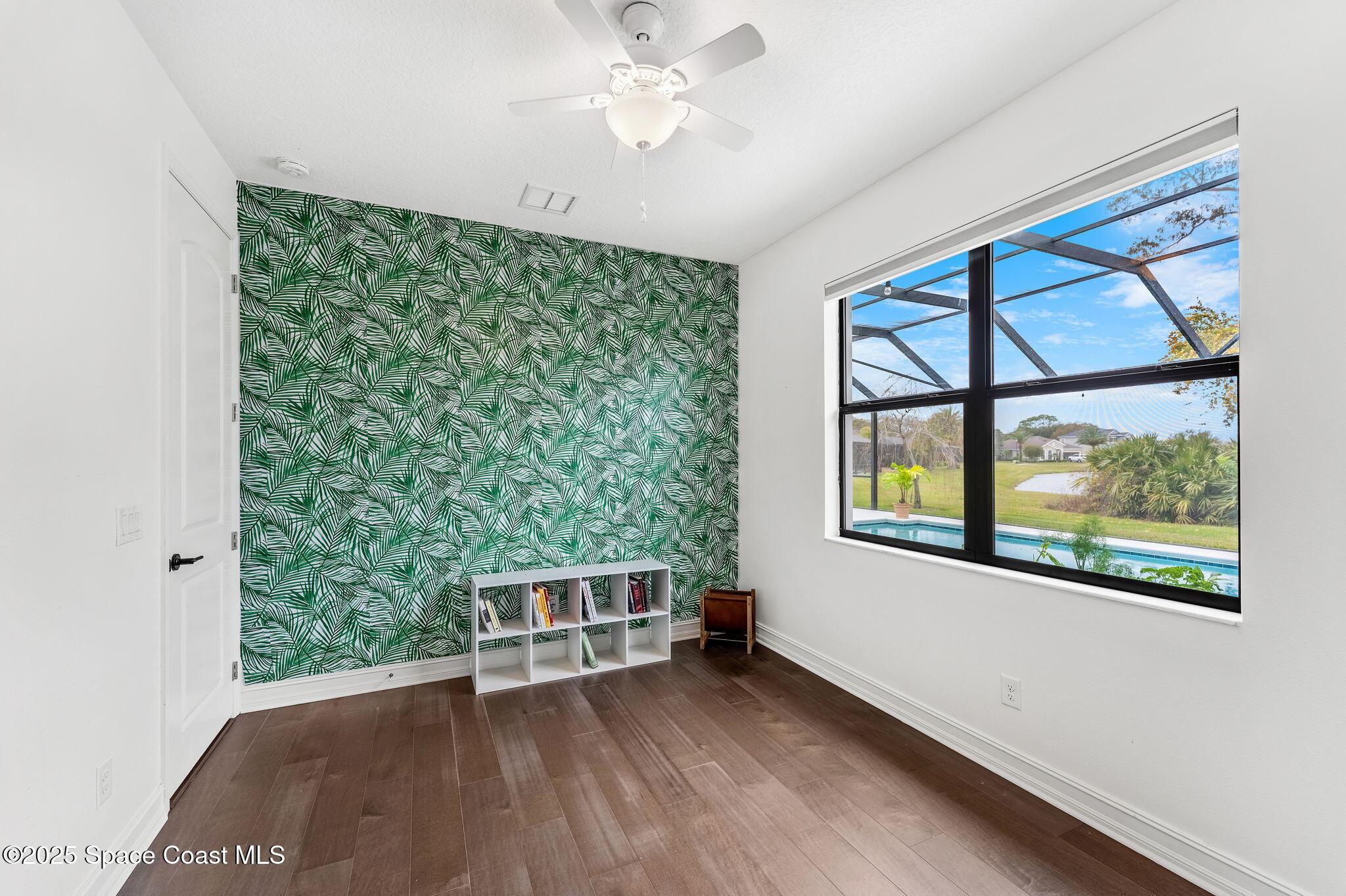 8545 Stalwart Circle Melbourne, FL 32940 - Photo 23 of 51 a view of an empty room with a window