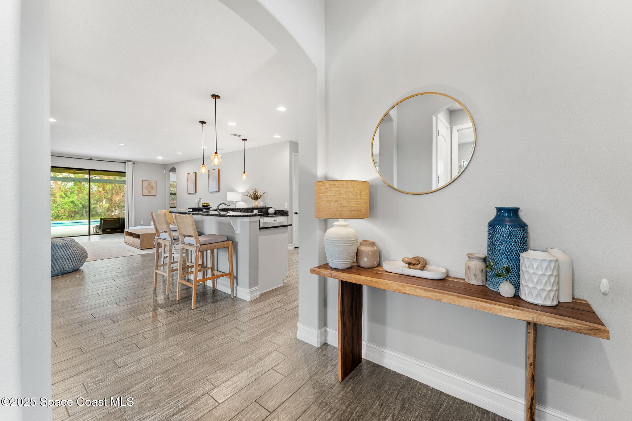 8545 Stalwart Circle Melbourne, FL 32940 - Photo 28 of 51 a kitchen with a table and chairs in it