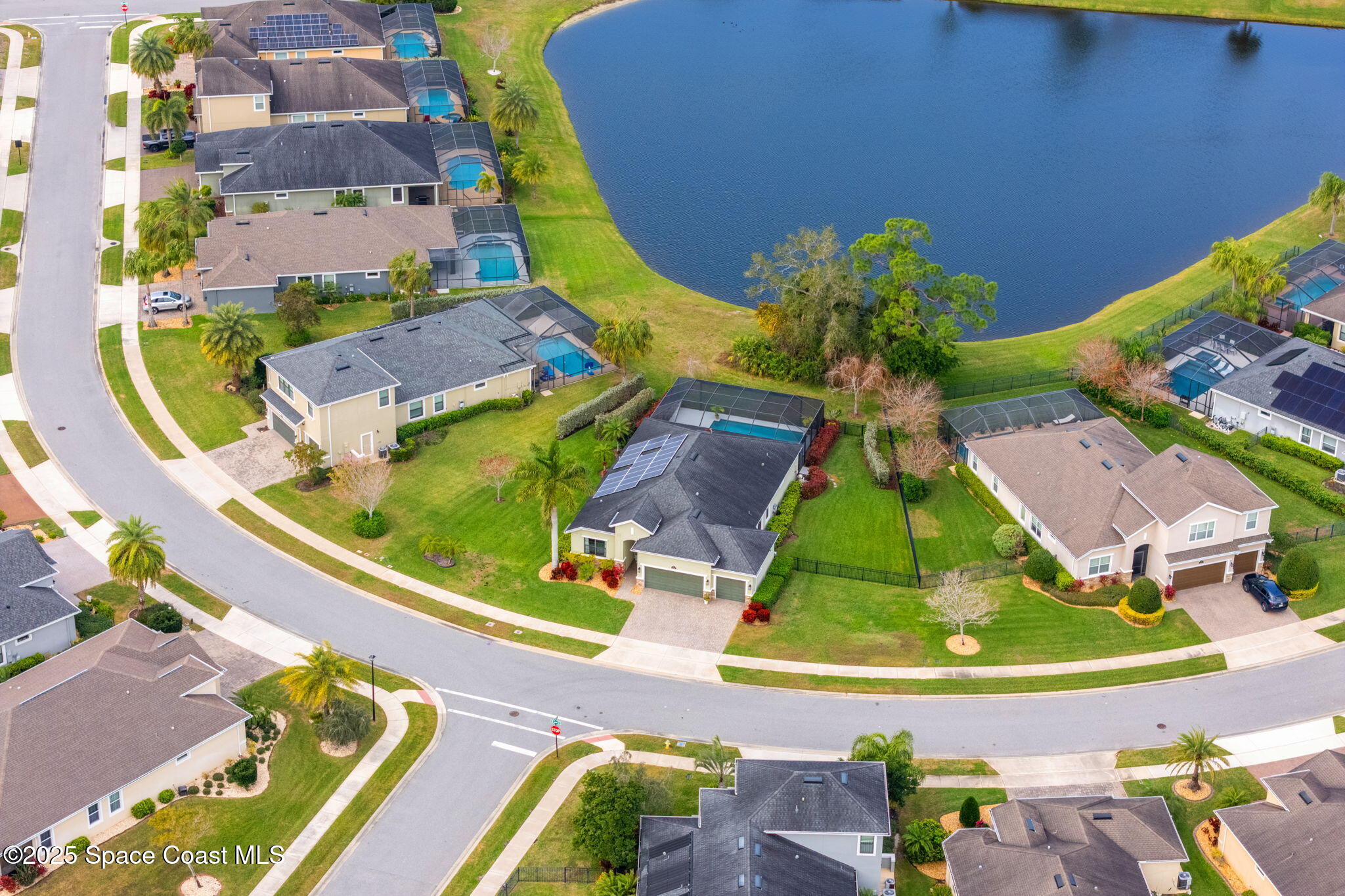 8545 Stalwart Circle Melbourne, FL 32940 - Photo 41 of 51 an aerial view of residential house with outdoor space and swimming pool