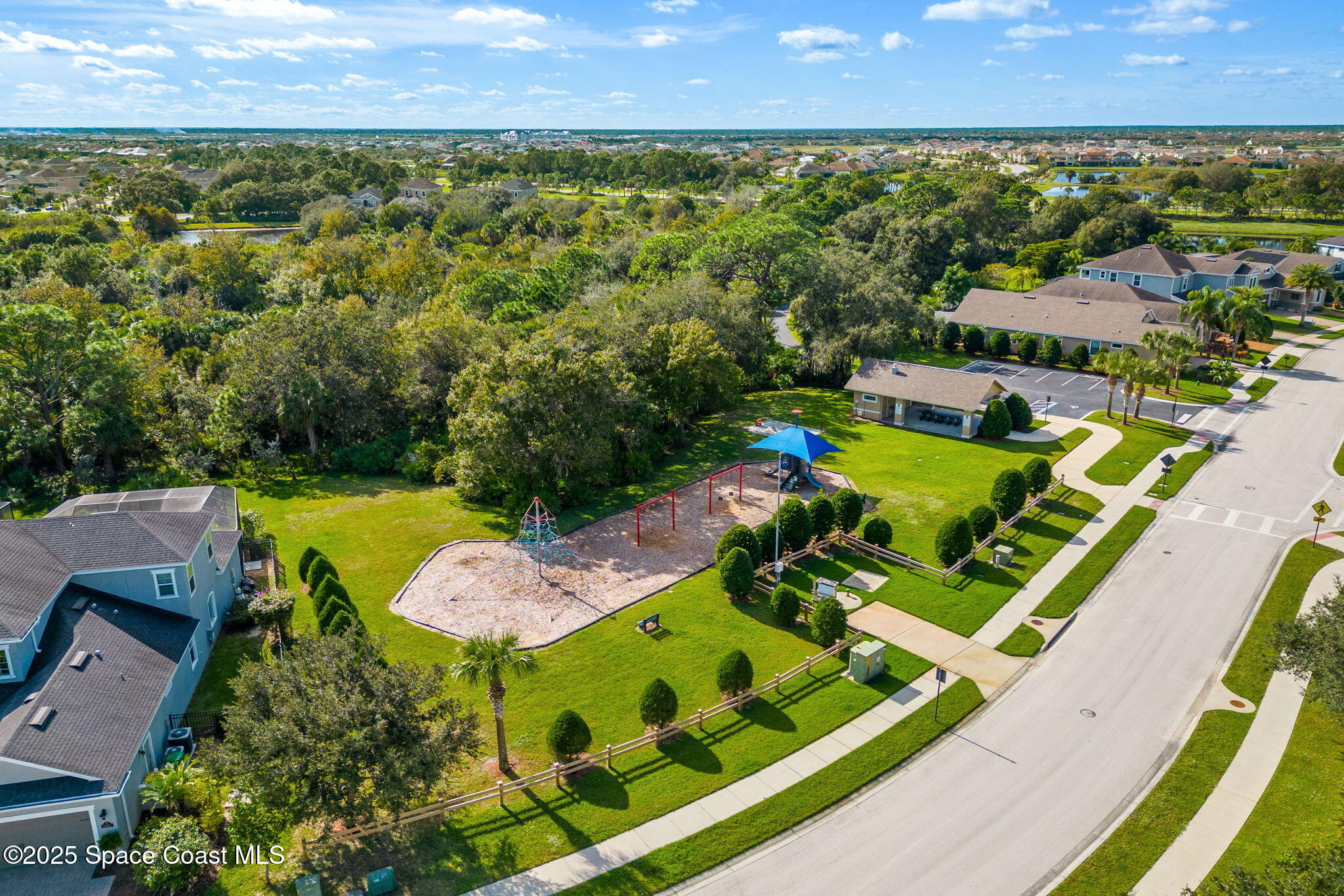 8545 Stalwart Circle Melbourne, FL 32940 - Photo 44 of 51 an aerial view of a pool patio swimming pool and outdoor seating