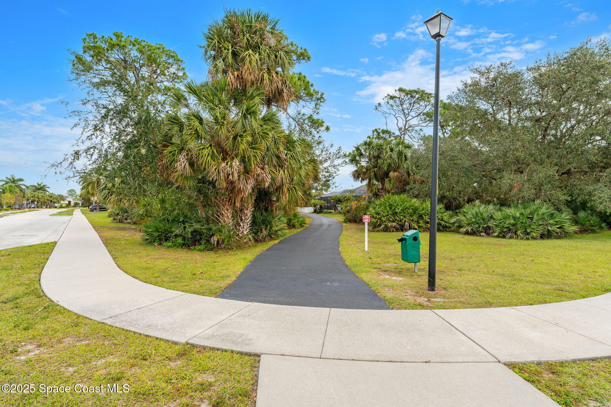 8545 Stalwart Circle Melbourne, FL 32940 - Photo 50 of 51 a view of a swimming pool with a yard