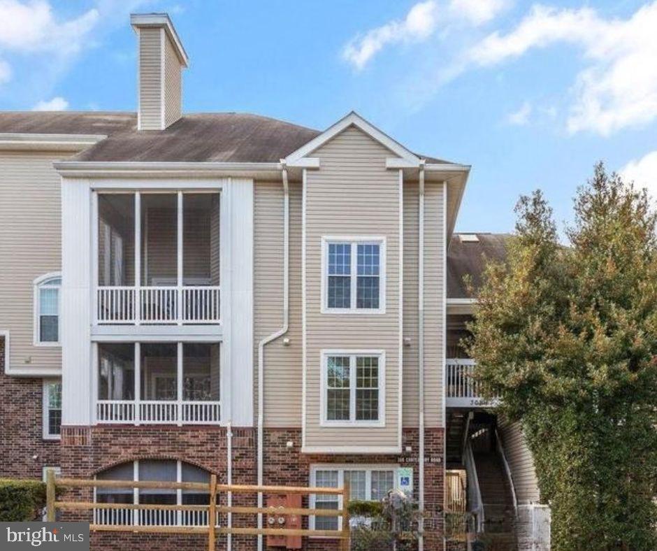 308 G Canterbury Road, Unit 308G Bel Air, MD 21014 - Photo 1 of 25 a front view of a house with a yard