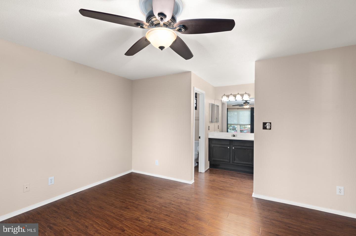 308 G Canterbury Road, Unit 308G Bel Air, MD 21014 - Photo 12 of 25 a view of an empty room with wooden floor