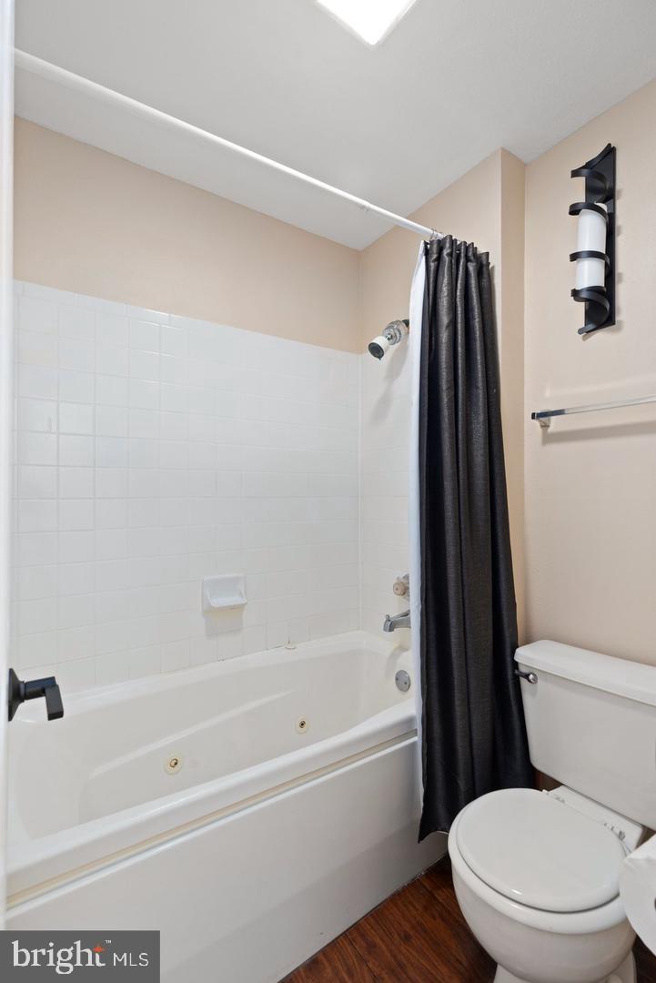 308 G Canterbury Road, Unit 308G Bel Air, MD 21014 - Photo 14 of 25 a white toilet sitting next to a bath tub