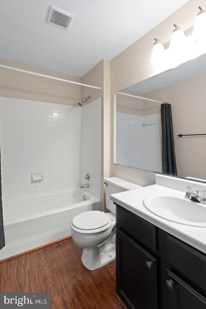 308 G Canterbury Road, Unit 308G Bel Air, MD 21014 - Photo 19 of 25 a bathroom with a sink a toilet a mirror and bathtub
