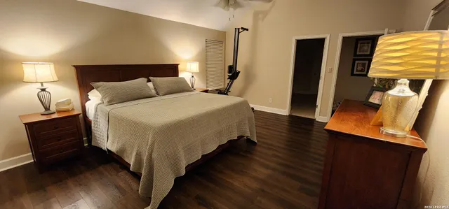 a bed room with a bed and a window