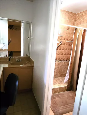 a view of walk in closet with window