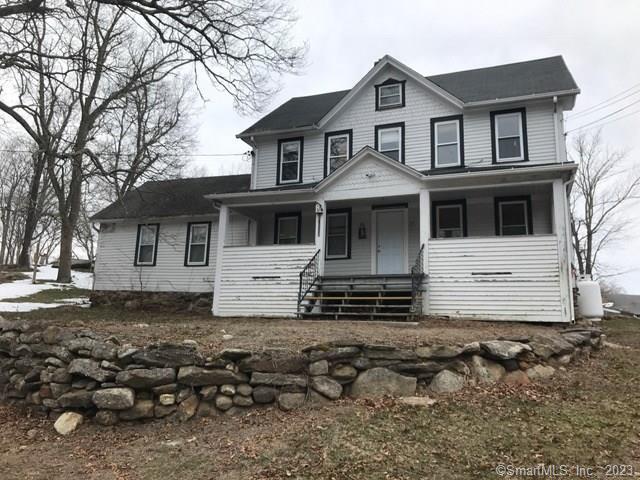 355 Lebanon Avenue Colchester, CT 06415 - Photo 1 of 6 a front view of a house with a yard