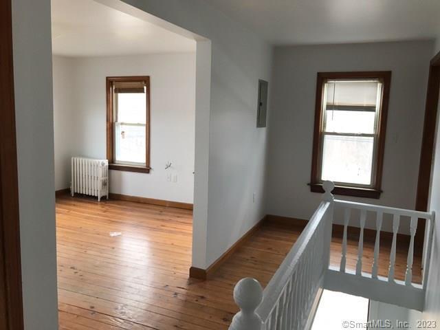 355 Lebanon Avenue Colchester, CT 06415 - Photo 5 of 6 a view of a room with wooden floor and windows