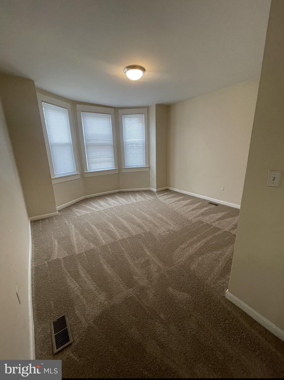2786 The Alameda Baltimore, MD 21218 - Photo 13 of 17 a view of an empty room with windows