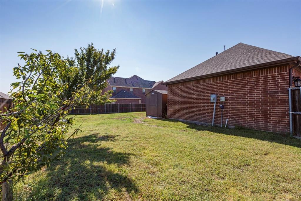 336 Red Hill Road Sunnyvale, TX 75182 - Photo 30 of 36 a view of a backyard of the house