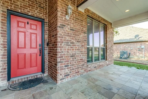 a view of front door with outdoor space