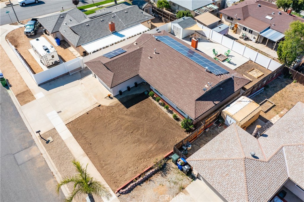 12780 Blossom Avenue Yucaipa, CA 92399 - Photo 30 of 31 an aerial view of residential house with parking