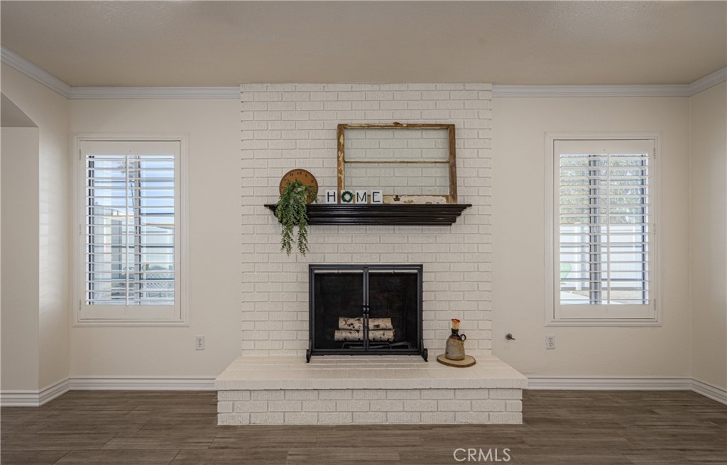 12780 Blossom Avenue Yucaipa, CA 92399 - Photo 7 of 31 a living room with furniture and a fireplace