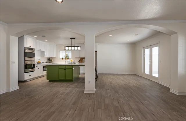 a view of kitchen with wooden floor