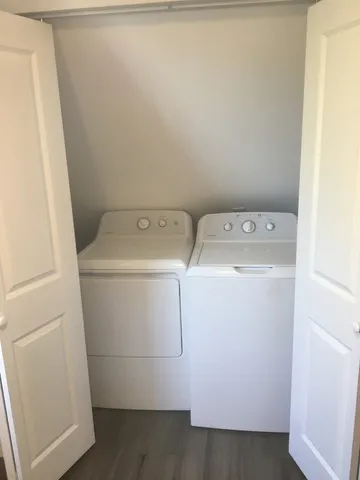 a utility room with dryer and washer