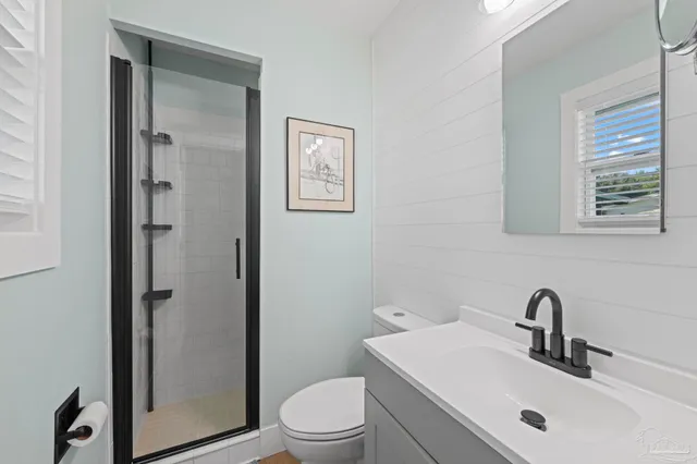 a room with gym equipment and windows