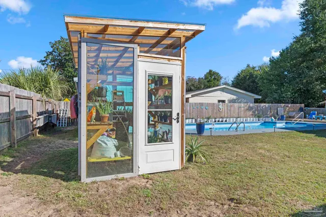 a front view of a house with a garage