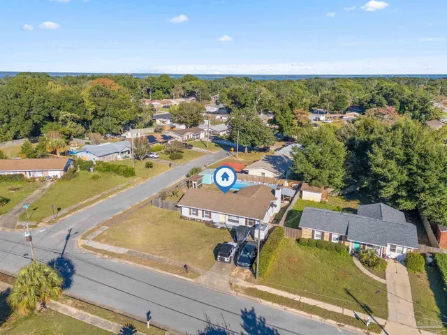 a view of a city with lawn chairs