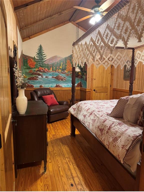 496 Beaver Dam Road Dahlonega, GA 30533 - Photo 14 of 28 a bedroom with a bed and a night stand