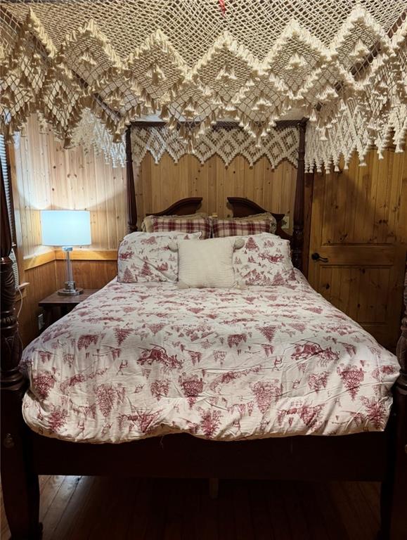 496 Beaver Dam Road Dahlonega, GA 30533 - Photo 16 of 28 a bed sitting in a bedroom next to a yard