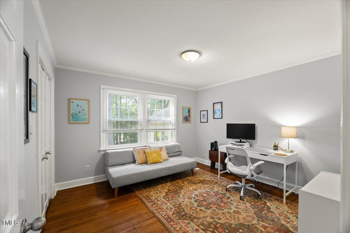 6117 Dodsworth Drive Raleigh, NC 27612 - Photo 19 of 54 a living room with furniture and a window