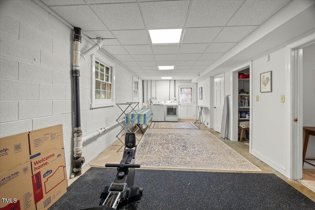 6117 Dodsworth Drive Raleigh, NC 27612 - Photo 35 of 54 a view of a room with gym equipment