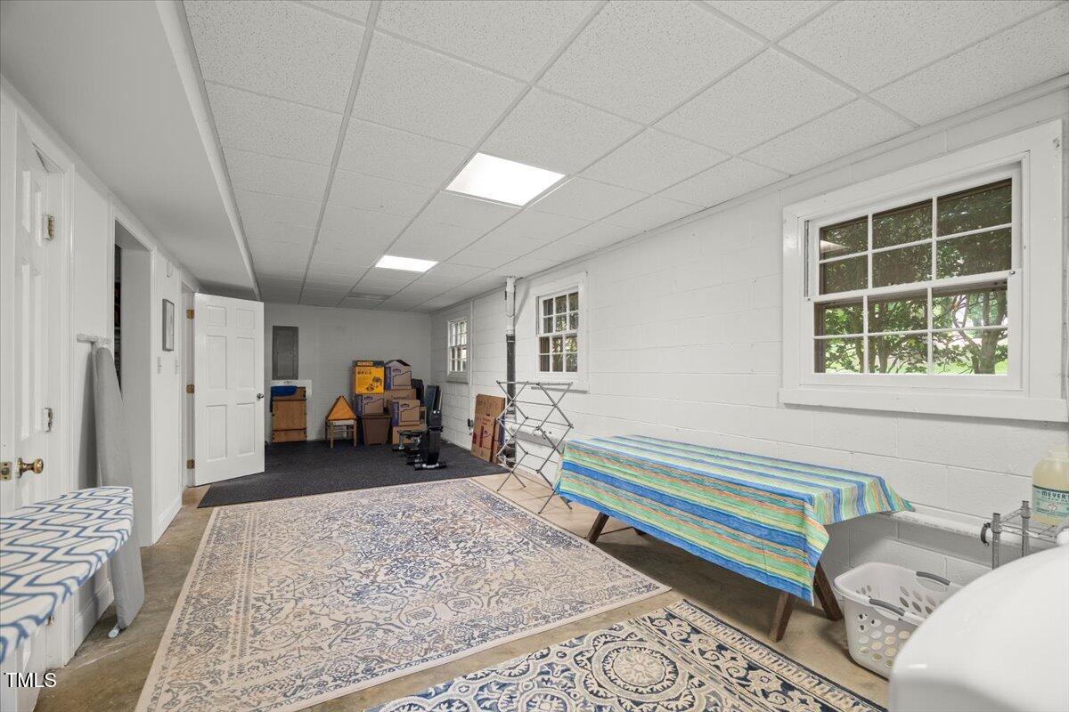 6117 Dodsworth Drive Raleigh, NC 27612 - Photo 37 of 54 a bed room with a bed and a window