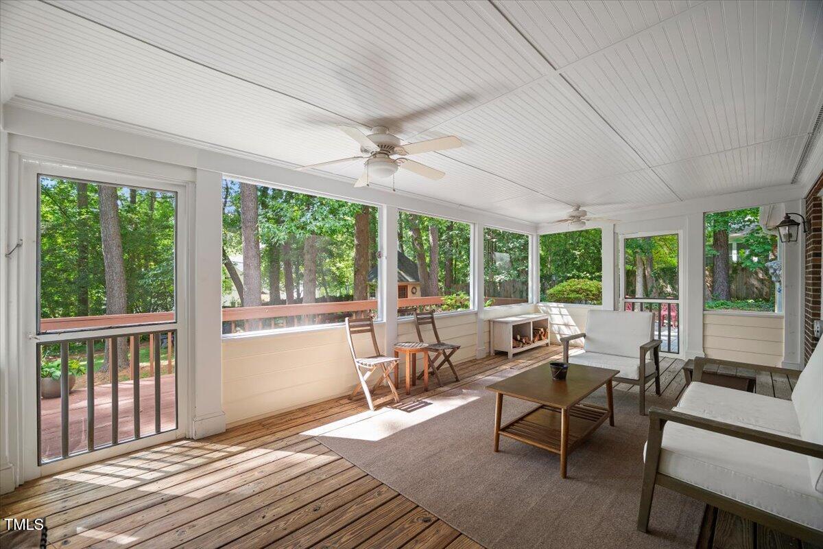 6117 Dodsworth Drive Raleigh, NC 27612 - Photo 38 of 54 a living room with furniture and windows