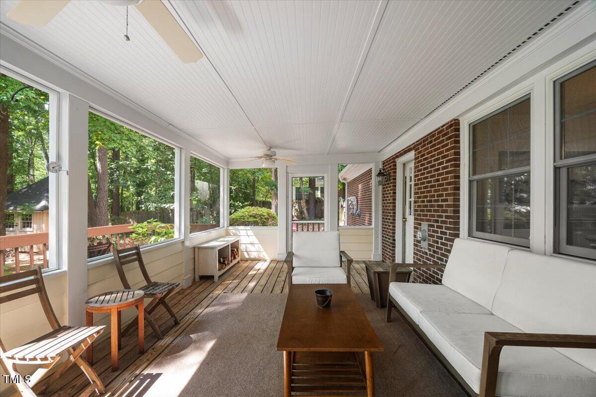 6117 Dodsworth Drive Raleigh, NC 27612 - Photo 39 of 54 a living room with furniture and large windows