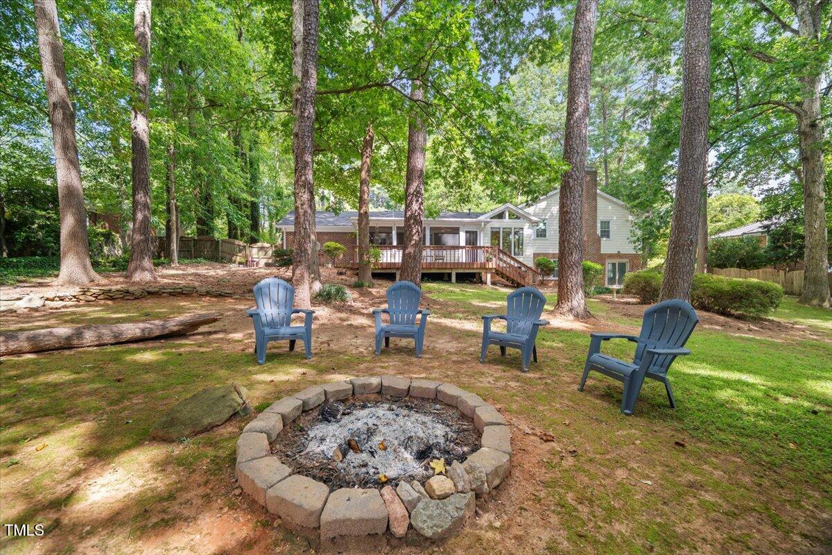6117 Dodsworth Drive Raleigh, NC 27612 - Photo 46 of 54 a view of a swimming pool with back yard