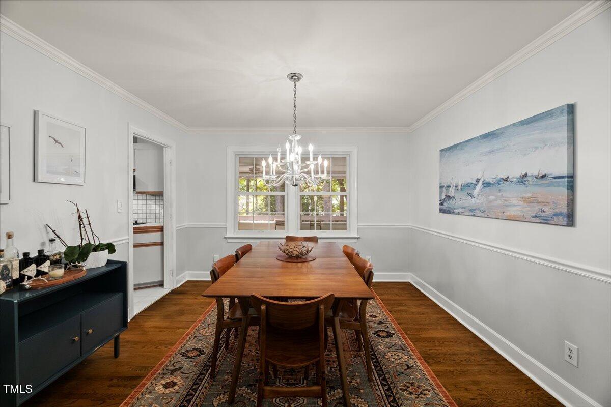 6117 Dodsworth Drive Raleigh, NC 27612 - Photo 10 of 54 a dining room with furniture and window
