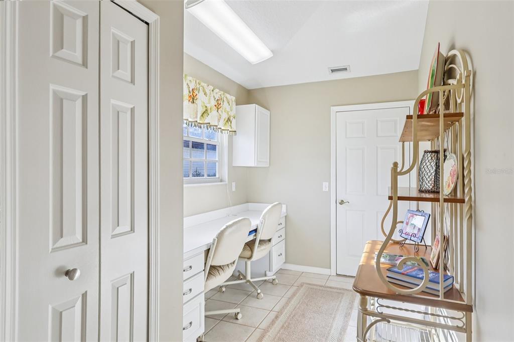 587 Juniper Way Tavares, FL 32778 - Photo 23 of 56 a view of a livingroom with furniture and windows