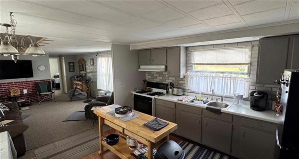 428 Meadows Drive Apollo, PA 15613 - Photo 5 of 16 a kitchen with a sink appliances and cabinets