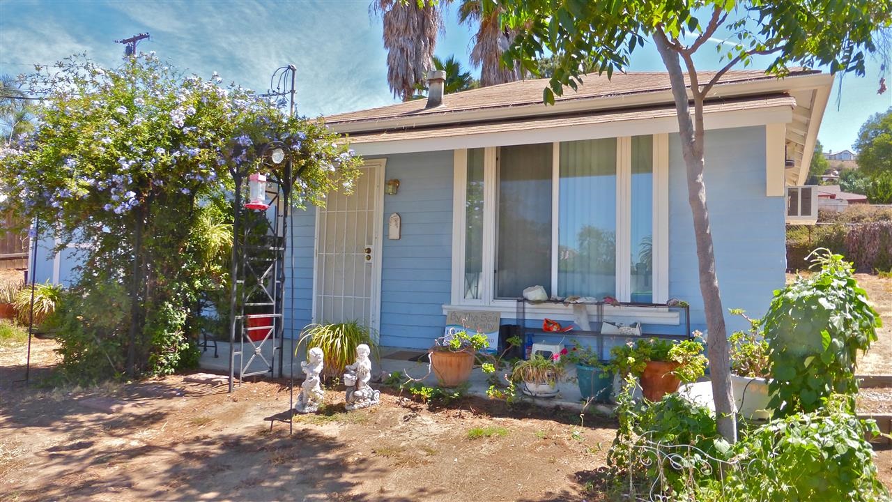 10455-59 Valle Vista Road Lakeside, CA 92040 - Photo 13 of 20 Front of this house actually faces towards the West so you get vista views at sunset. This charming home has been owner occupied for a number of years.