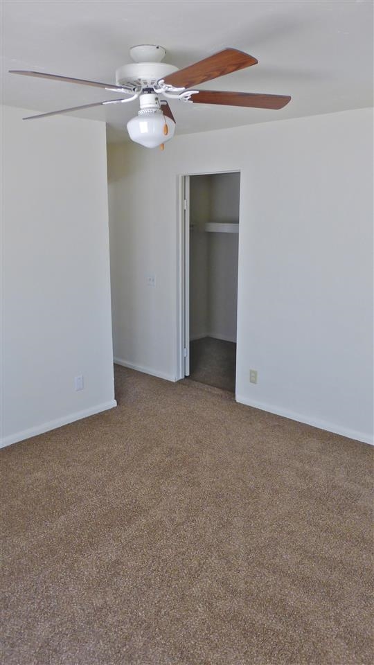 10455-59 Valle Vista Road Lakeside, CA 92040 - Photo 6 of 20 Master Bedroom is located off the Living Room and has a good sized closet. 3/4 Bathroom is located off the living room. There is a sliding glass door off of the MBR that leads out to the west side of the property.