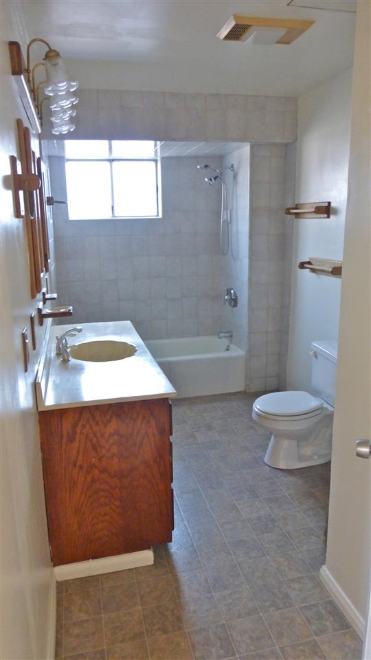 10455-59 Valle Vista Road Lakeside, CA 92040 - Photo 10 of 20 This bathroom is located off the hallway between the front and back bedrooms of the 3 BR house.